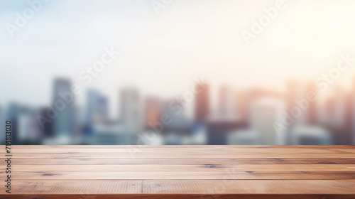 wood table top white blurred city background from office window