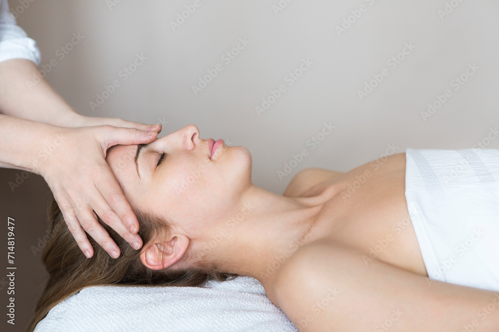 Face massage or beauty treatment in spa salon Face massage or beauty treatment in spa salon