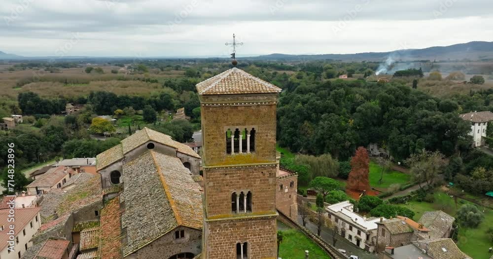 Aerial view cityscape Sutri Italy. Landscape of the ancient Belfry of the ancient cathedral in the center of a small town on the Iberian Peninsula. High quality 4k footage Aerial view cityscape Sutri Italy. Landscape of the ancient Belfry of the ancient cathedral in the center of a small town on the Iberian Peninsula. High quality 4k footage