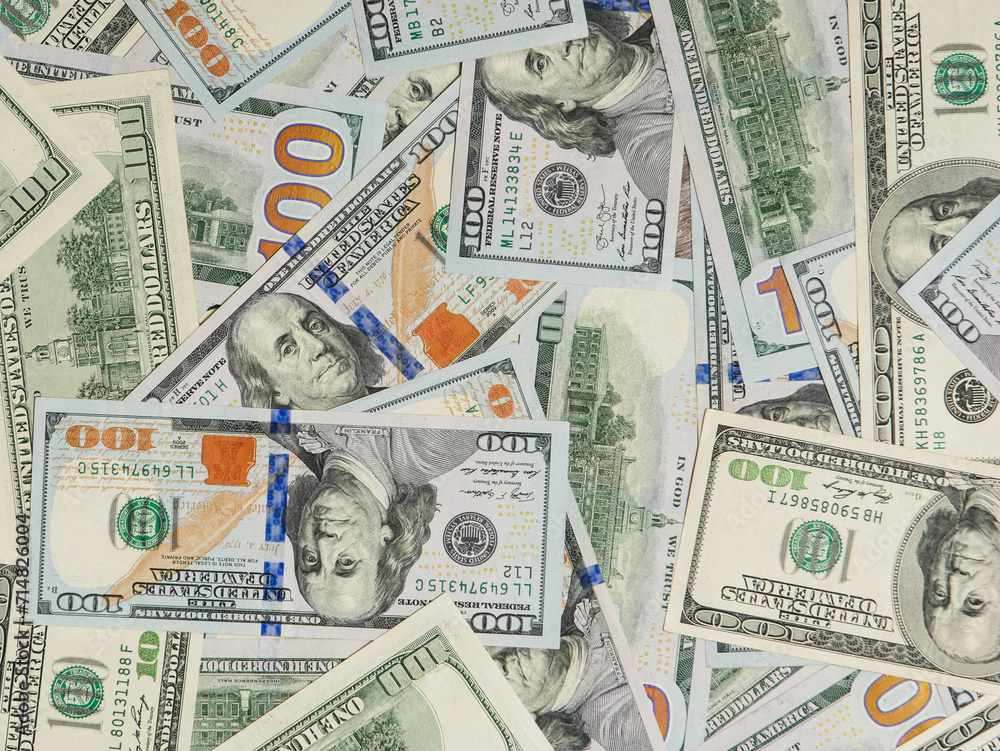 Background of 100 dollar bills, top view. Background of 100 dollar bills, top view.