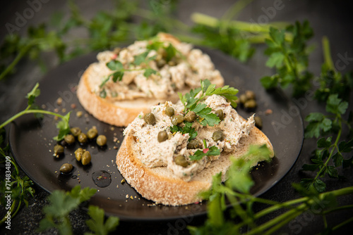 sandwich with mackerel paste, capers and parsley