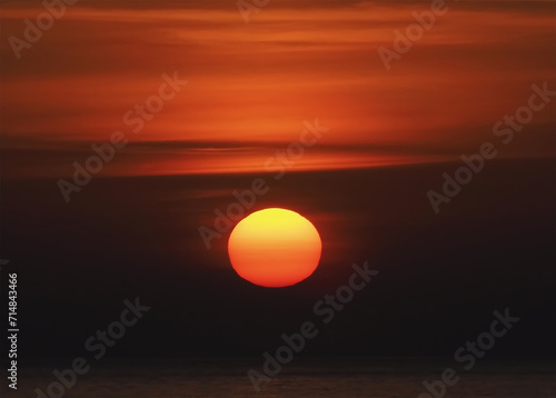 Orange Sun forms a ball during sunset © Stimmungsbilder1