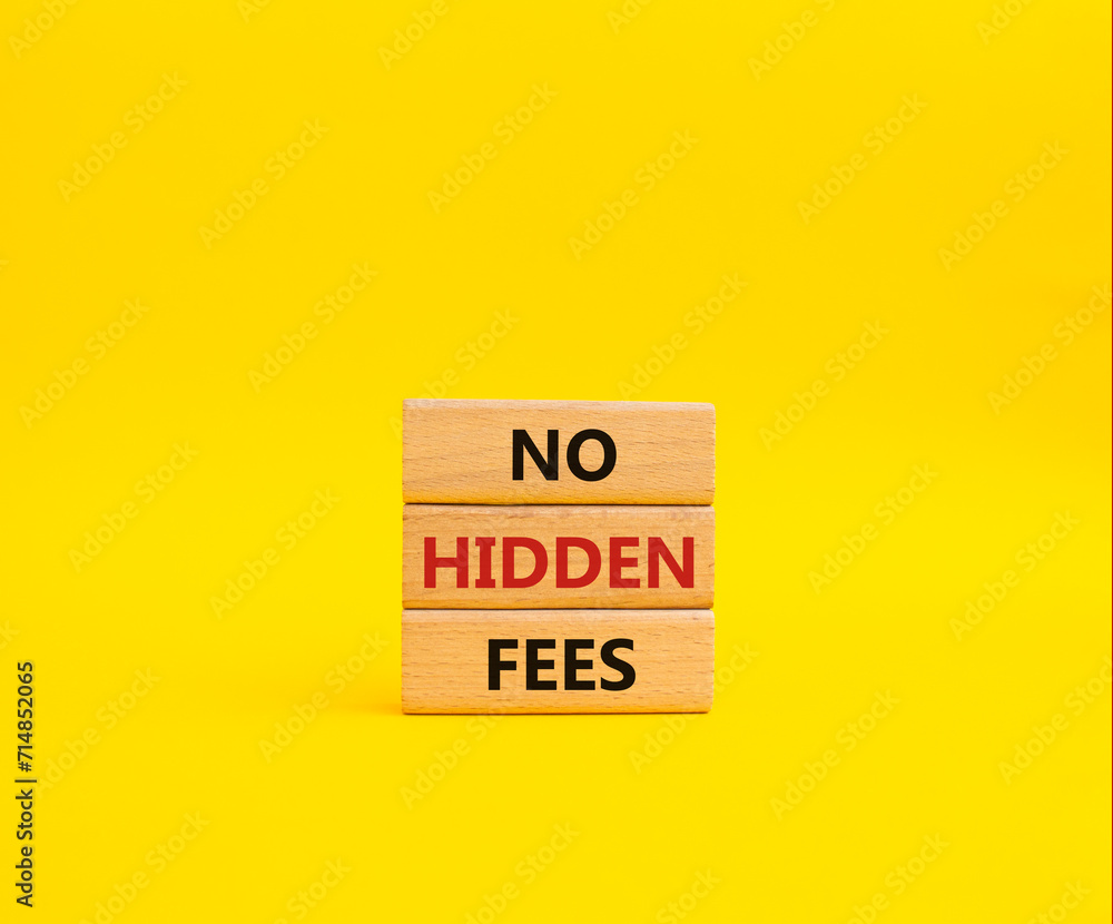 No Hidden Fees symbol. Concept words No Hidden Fees on wooden blocks. Beautiful yellow background. Business and No Hidden Fees concept. Copy space. No Hidden Fees symbol. Concept words No Hidden Fees on wooden blocks. Beautiful yellow background. Business and No Hidden Fees concept. Copy space.