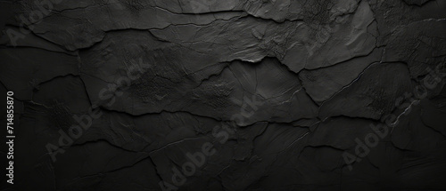 Textured Black Slate Background with Natural Patterns. Dark, moody tones, grunge style photo