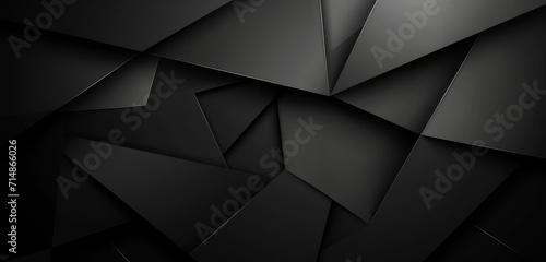 Sleek black geometric shapes on a dark, textured background.
