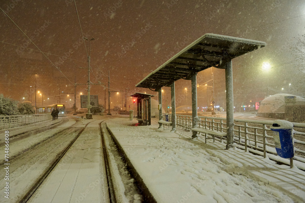 People in traffic through snow in Bucharest, Romania, January 20, 2024