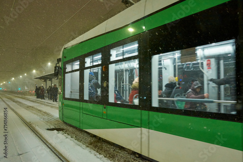 Obraz na płótnie People in traffic through snow in Bucharest, Romania, January 20, 2024 w salonie