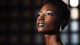 Elegant African Woman with Serene Expression. African woman in soft lighting, exuding elegance and serenity.