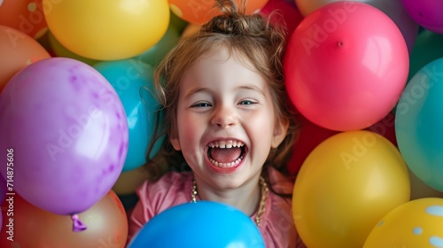 A happy child, enveloped in vibrant Easter balloons, radiating joy on this joyous occasion © Stone Shoaib