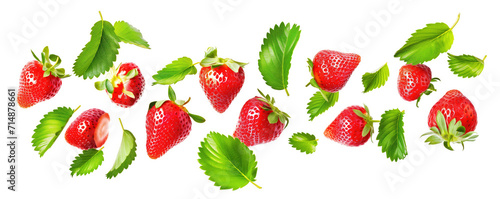 Juicy ripe strawberries with green leaves flying on white background
