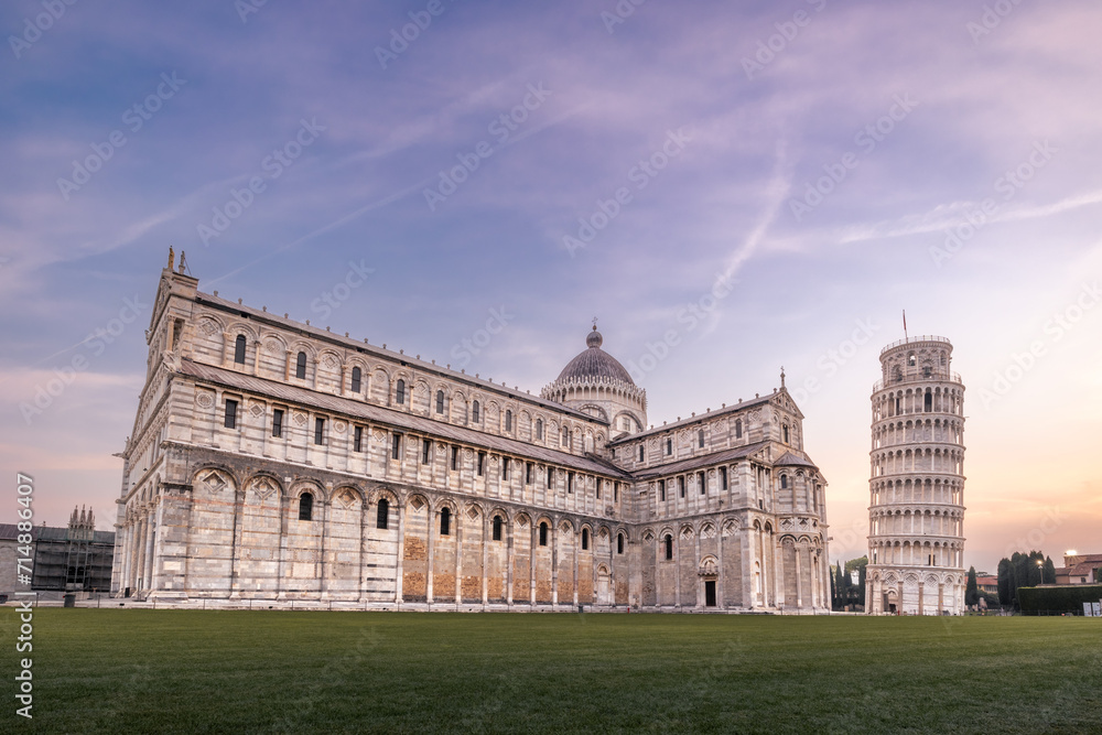 Piazza del Duomo with Leaning Tower and Cattedrale di Pisa against sunrise colorful sky, Pisa, Italy