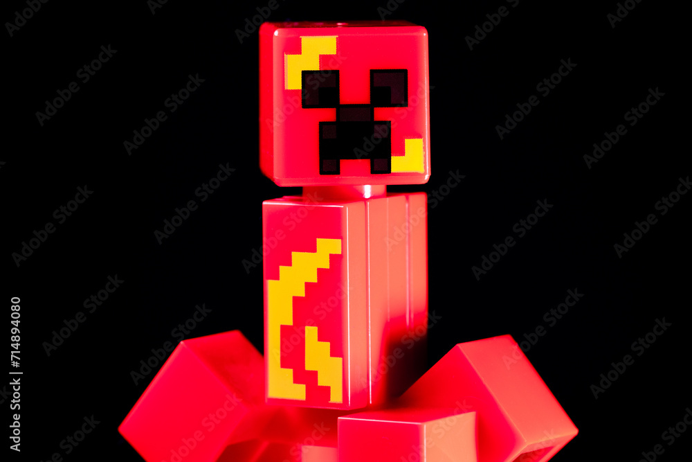 Naklejka premium LEGO Minecraft Lava Creeper Mob on the black background
