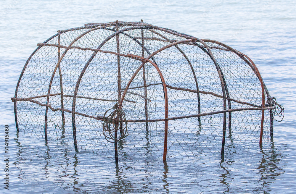 Basket fish trap catch crabs,lobsters fishes on the ocean StockFoto
