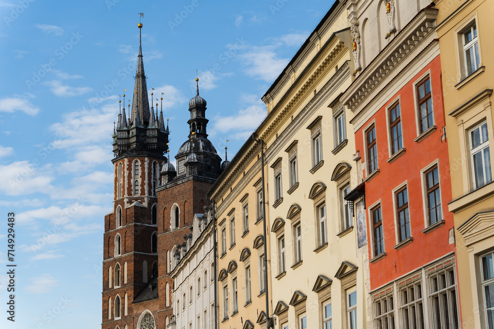 The old town of Krakow and St. Mary's Church against the blue sky.