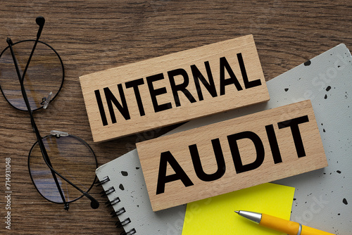 Wallpaper Mural INTERNAL AUDIT. text on wooden blocks. glasses and notepad Torontodigital.ca