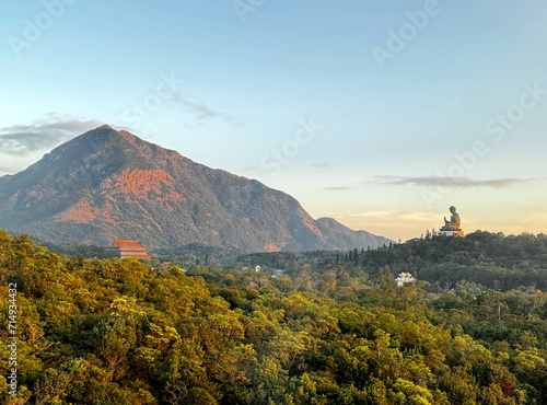 Breathtaking view of cable car Ngong Ping 360, at Lantau Island, Hong Kong. Ngong Ping is one of famous destination at Hong Kong with the cable car to see the hills, condo, and country side from above photo