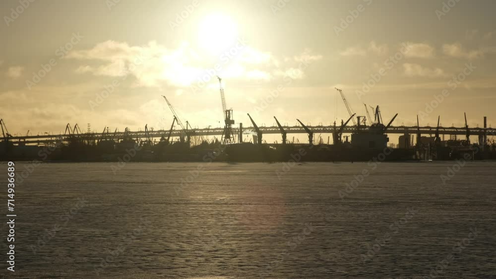 bridge and industrial area at sunset in winter