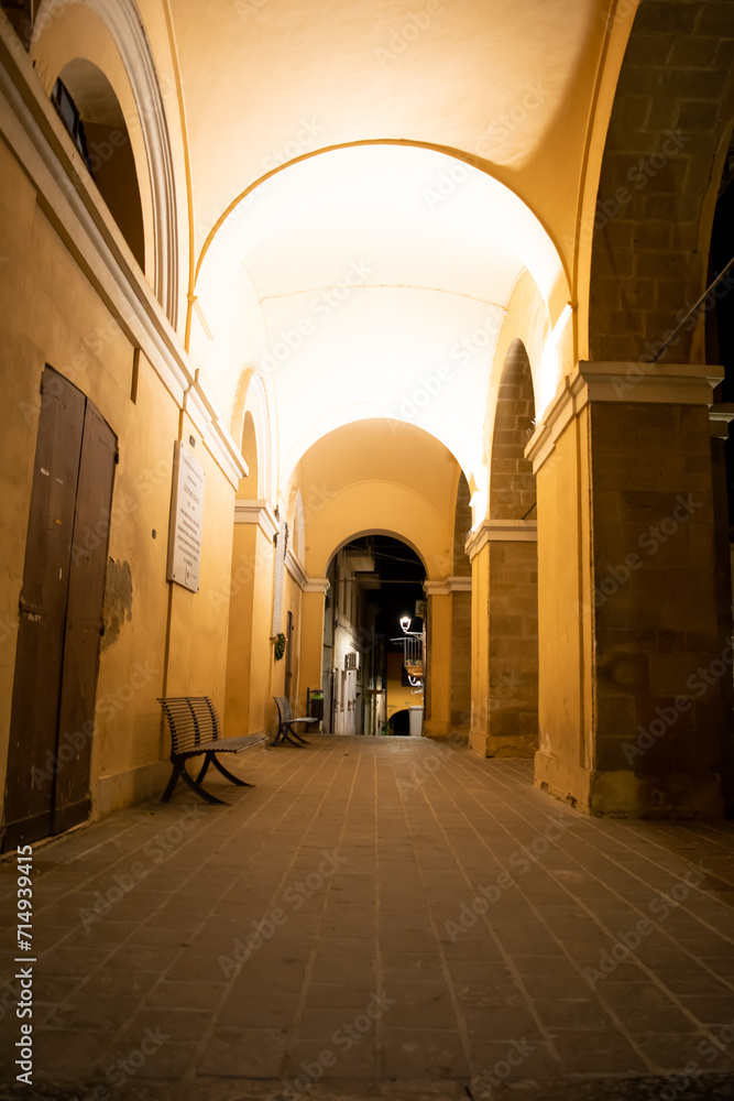 Archway in the old town at night