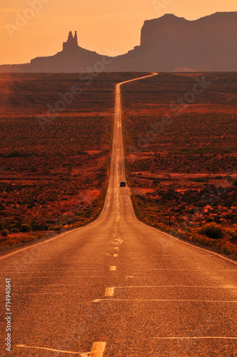 Classic view from US Route 163 towards the buttes and mesas of the Monument Valley Navajo Tribal Park, Utah-Arizona border, USA.
