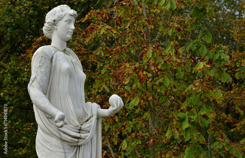 Versailles; France - october 27 2023 : statue in the castle park photo