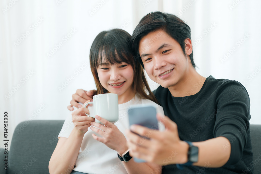 Happy Couple Sharing a Moment with Smartphone. Happy Couple Sharing a Moment with Smartphone.