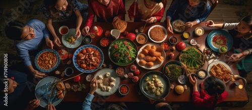 A family gathering around a table