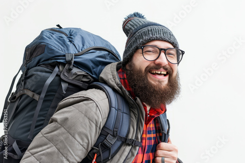 Bearded Man With Backpack Walking Outdoors on a Sunny Day