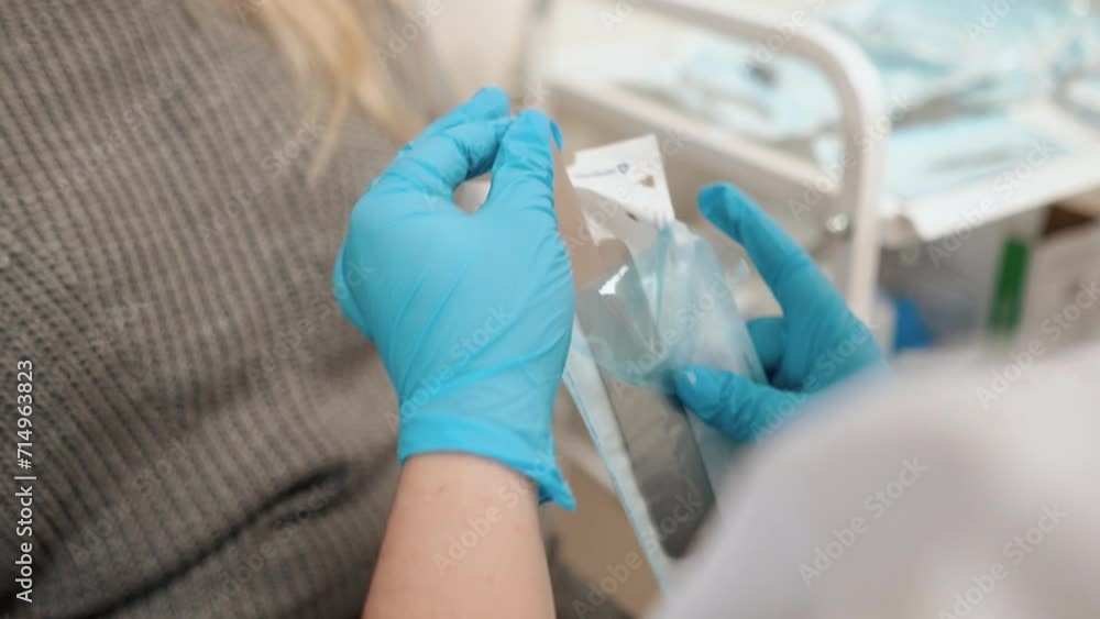 a doctor in a medical hospital is preparing to give an injection with a vaccine to a patient against a virus, close-up, vaccination a doctor in a medical hospital is preparing to give an injection with a vaccine to a patient against a virus, close-up, vaccination
