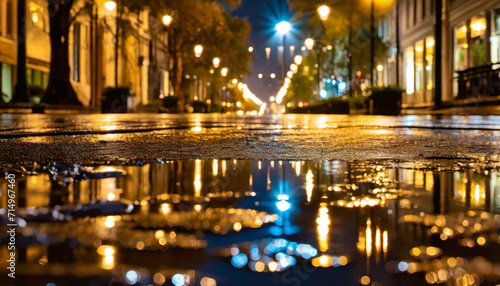 Reflection in a puddle on a night city street © SashaMagic
