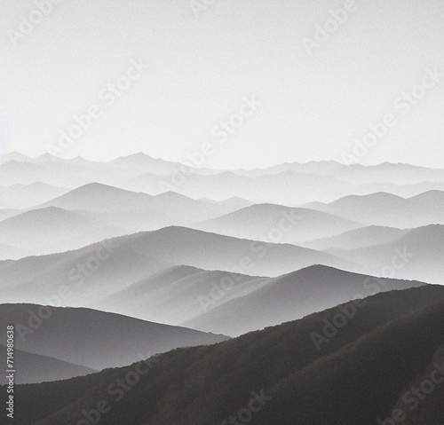Mountains in the fog. Beautiful background with empty copy space. Mountain peak with clouds. Minimalist backdrop. Nature, success, travel, holiday concept 