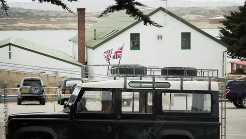 British Flags on An Old British Vehicle in Port Stanley, Falkland Islands (Islas Malvinas), South Atlantic Ocean. 4K Resolution. photo