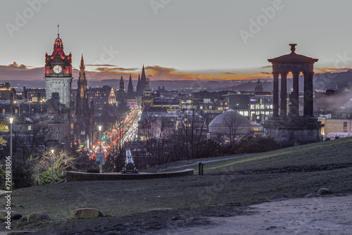 Aerial view at dusk of the Royal Mile or High Street in Edinburgh Old Town from the hilltop of Calton Hill in central Edinburgh. Destinations in Europe  Space for text  Selective focus.
