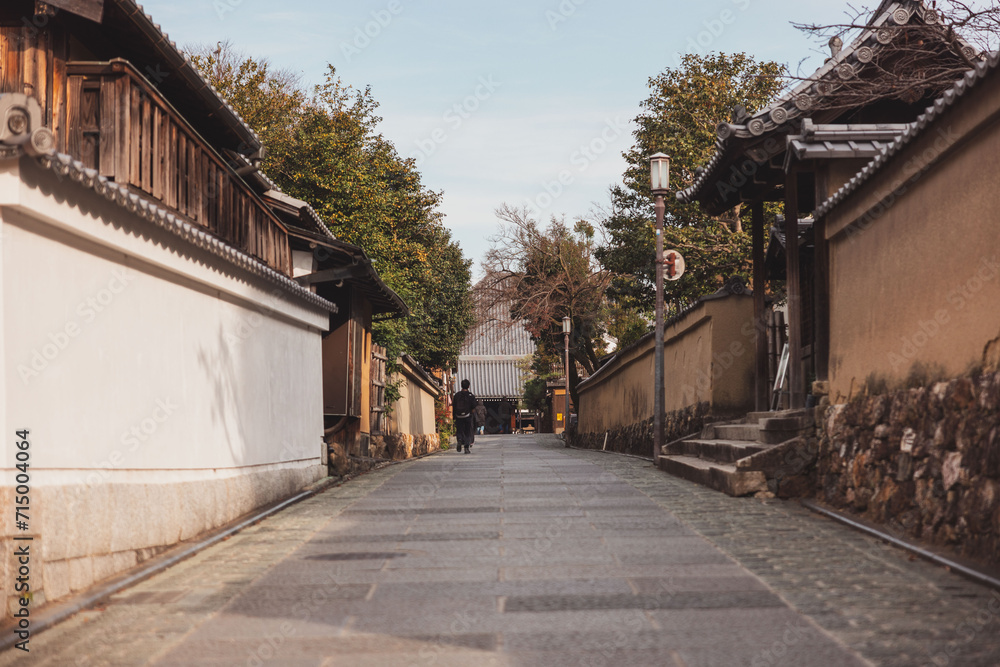 Man walking down street in Kyoto