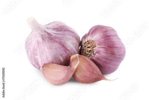 Fresh raw garlic heads and cloves isolated on white