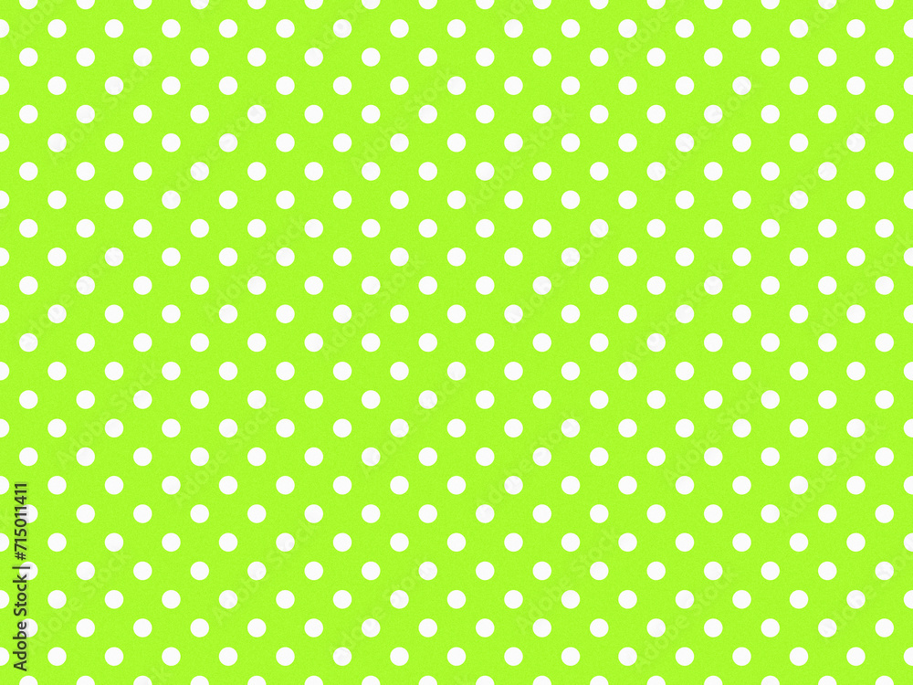texturised white color polka dots over green yellow background