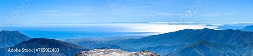 Panoramic view on Mediterranean sea and Gibraltar from the Torrecilla peak, Sierra de las Nieves national park, Andalusia, Spain