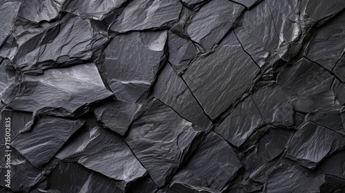 Close-up of a dark slate texture with natural patterns. photo