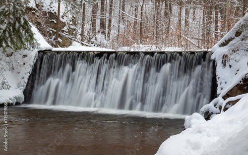 Kropelka waterfall in winter, Lower Silesia, Poland.