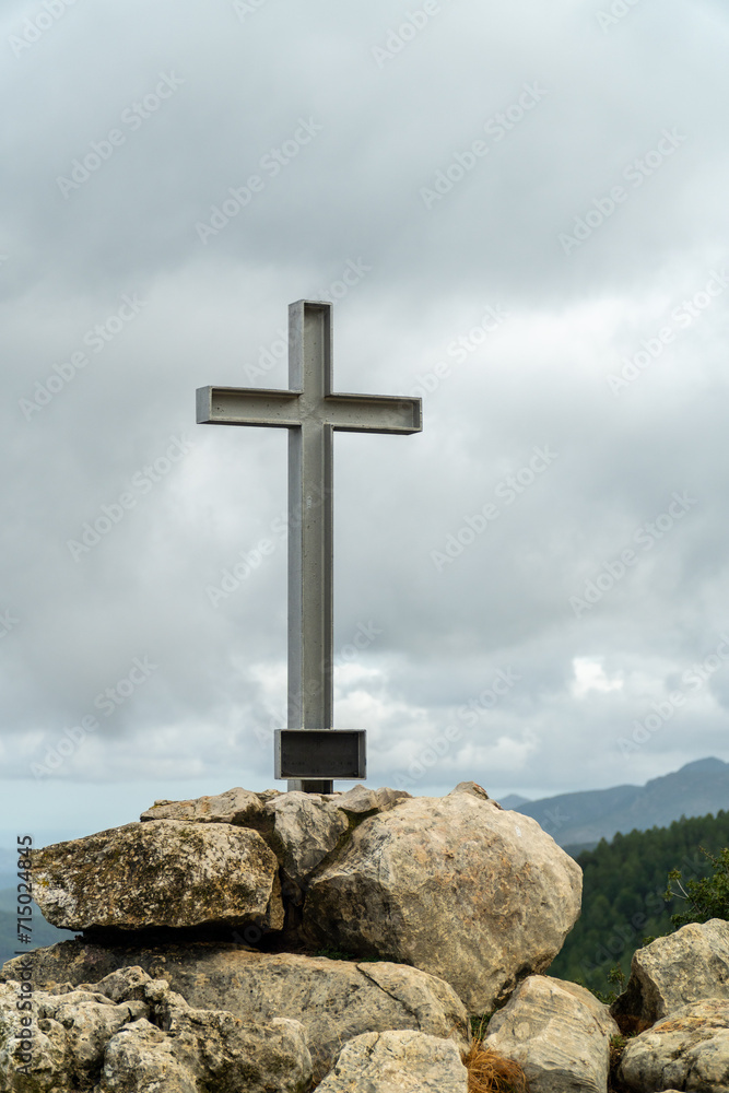 Cross on the hill on a cloudy winter day Cross on the hill on a cloudy winter day