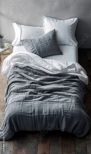 Top view of bed duvet, single pillow, one-pillow