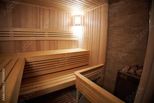 Interior of Finnish sauna  classic wooden sauna with hot steam. Russian bathroom.