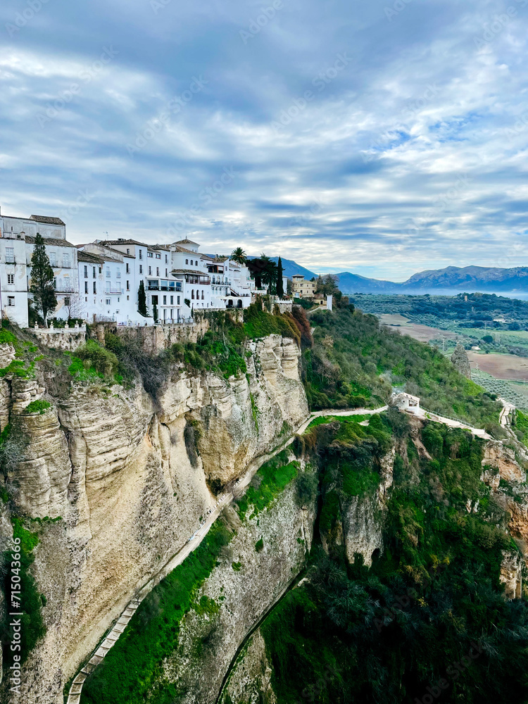 Panoramic Overlook of Ronda: A Majestic Landscape with Mountains, Ancient Castle, and Charming Village