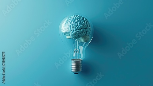 A light bulb with a brain inside. Can be used to represent creativity, innovation, or bright ideas photo