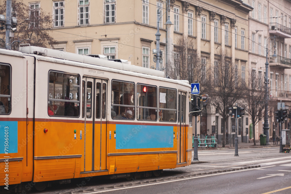 yellow tram on the street, public transport