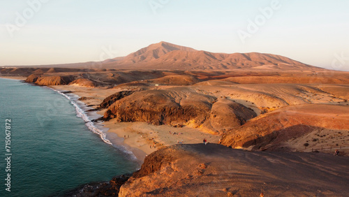 Coastline Atlantik Ocean view from above. Sunset above Mountain and Ocean. Canary Islands. Lanzarote 