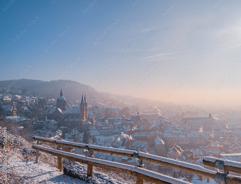 panorama of a town in the winter with fog and snow 
