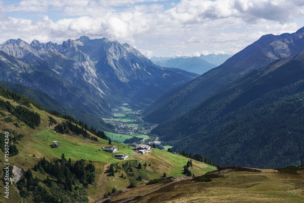 Looking over the valley towards St Anton am Arlberg from the mountain range Treffpunkt Galzig Jennewein in Austria