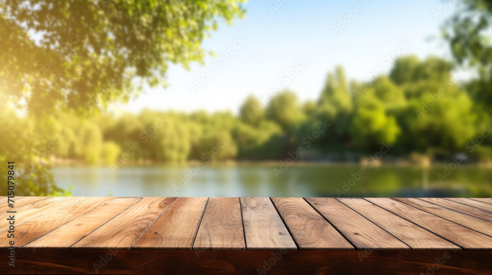 Wooden tabletop near river background and blurred green landscape for displaying or mounting your products Wooden tabletop near river background and blurred green landscape for displaying or mounting your products
