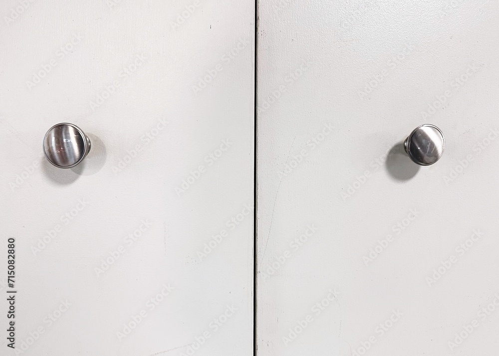 White cabinet doors with brushed nickel pull knobs White cabinet doors with brushed nickel pull knobs