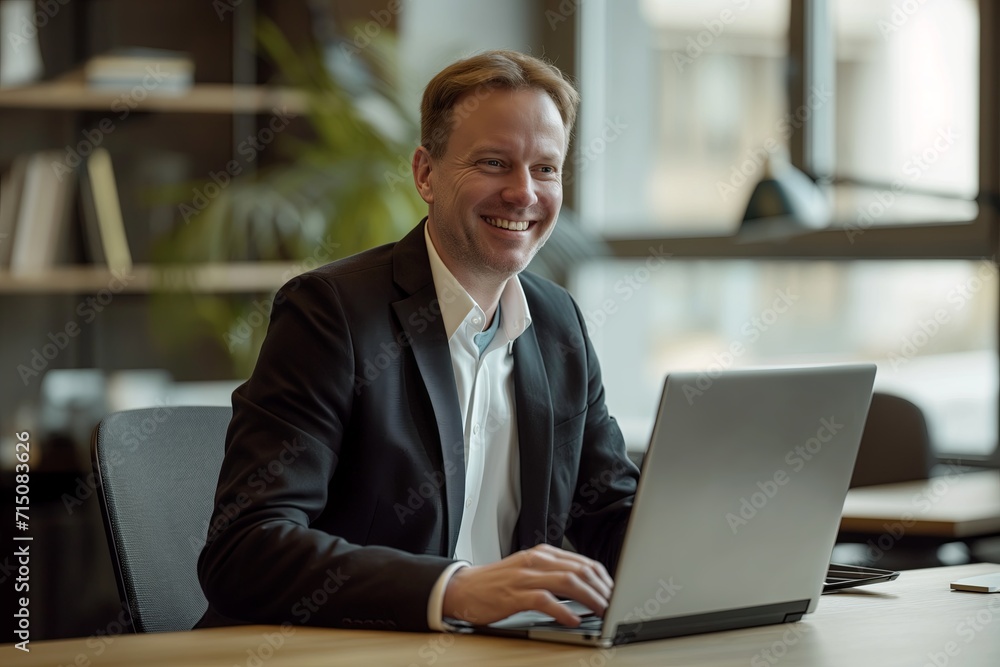 Happy mature business man executive manager looking at laptop computer watching online webinar or having remote virtual meeting, video conference call negotiation Happy mature business man executive manager looking at laptop computer watching online webinar or having remote virtual meeting, video conference call negotiation